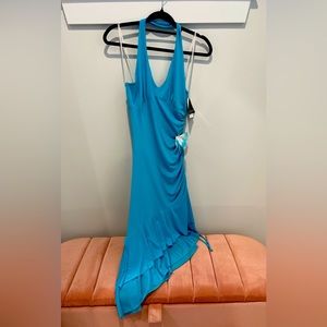 Brand new dress, more of a turquoise color. Perfect for a wedding!